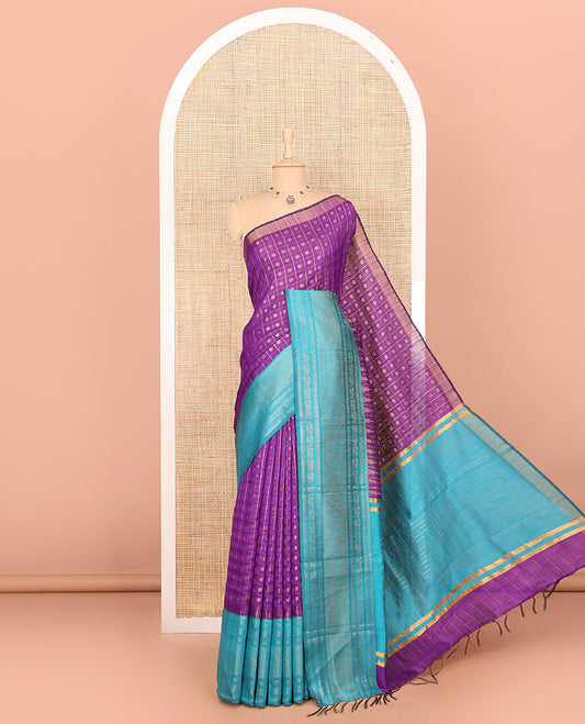 Violet polka dot butta enclosed checked semi-raw silk saree, contrast traditional zari design border, contrast diamond patterned pallu, and a contrast blouse