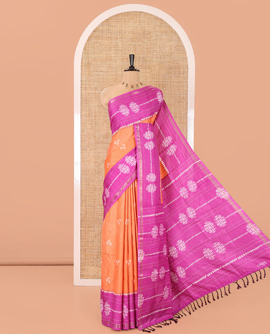 Orange Manipuri Silk Saree, Decked Up with Bandhani Buttas on Its Body, Complemented by a Contrast Border of Shibori Print and Kantha Thread Work, Pallu of Shibori Print, and Paired with a Contrast Blouse