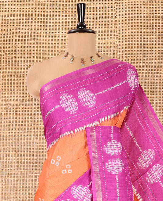Orange Manipuri Silk Saree, Decked Up with Bandhani Buttas on Its Body, Complemented by a Contrast Border of Shibori Print and Kantha Thread Work, Pallu of Shibori Print, and Paired with a Contrast Blouse