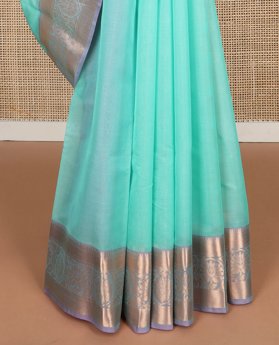 Sea green floral motifs silk cotton saree with contrast zari design border & floral design pallu