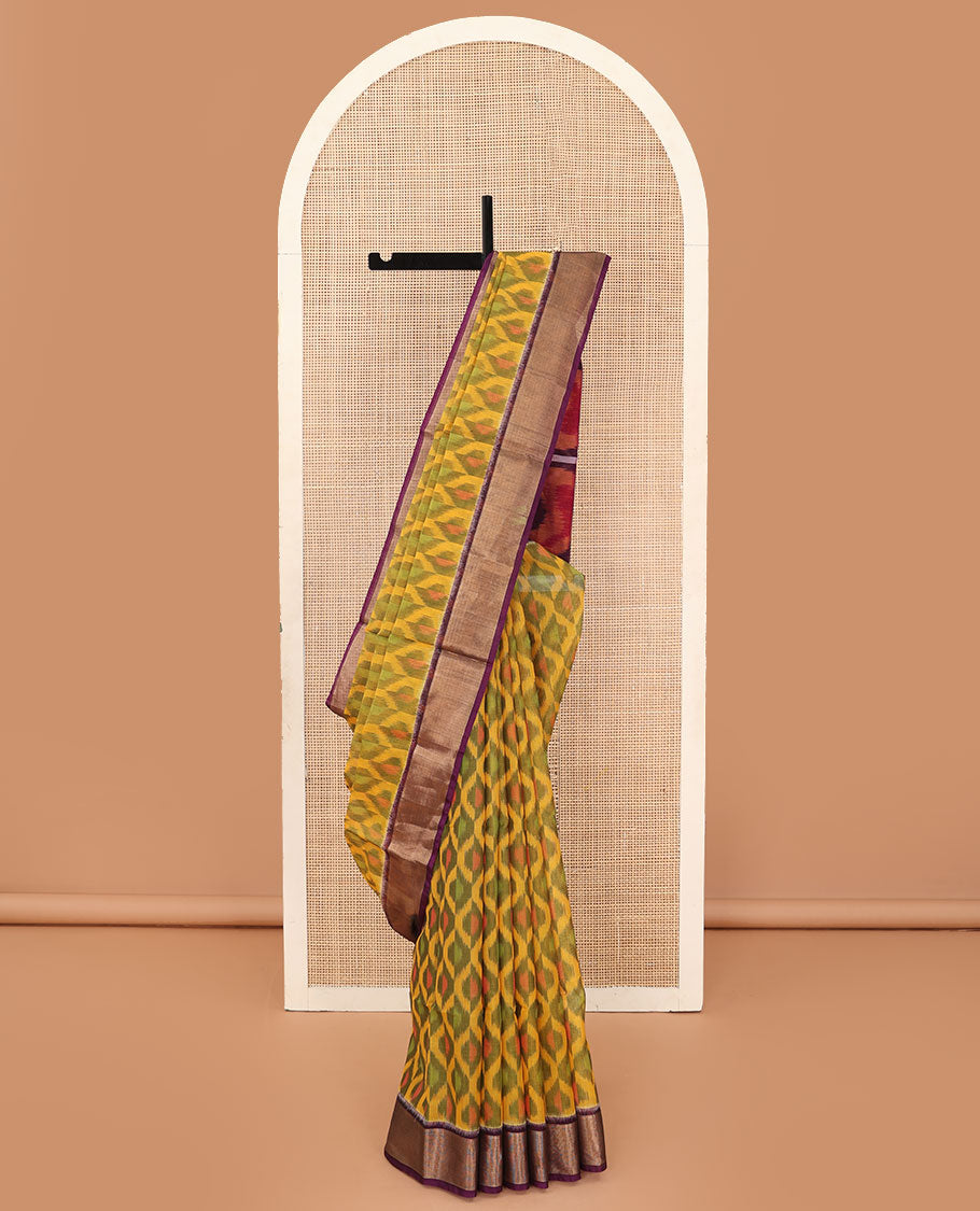 Yellow ikkat ogee patterned silk cotton saree, contrast zari bavanji border, and pallu of paisleys and checks