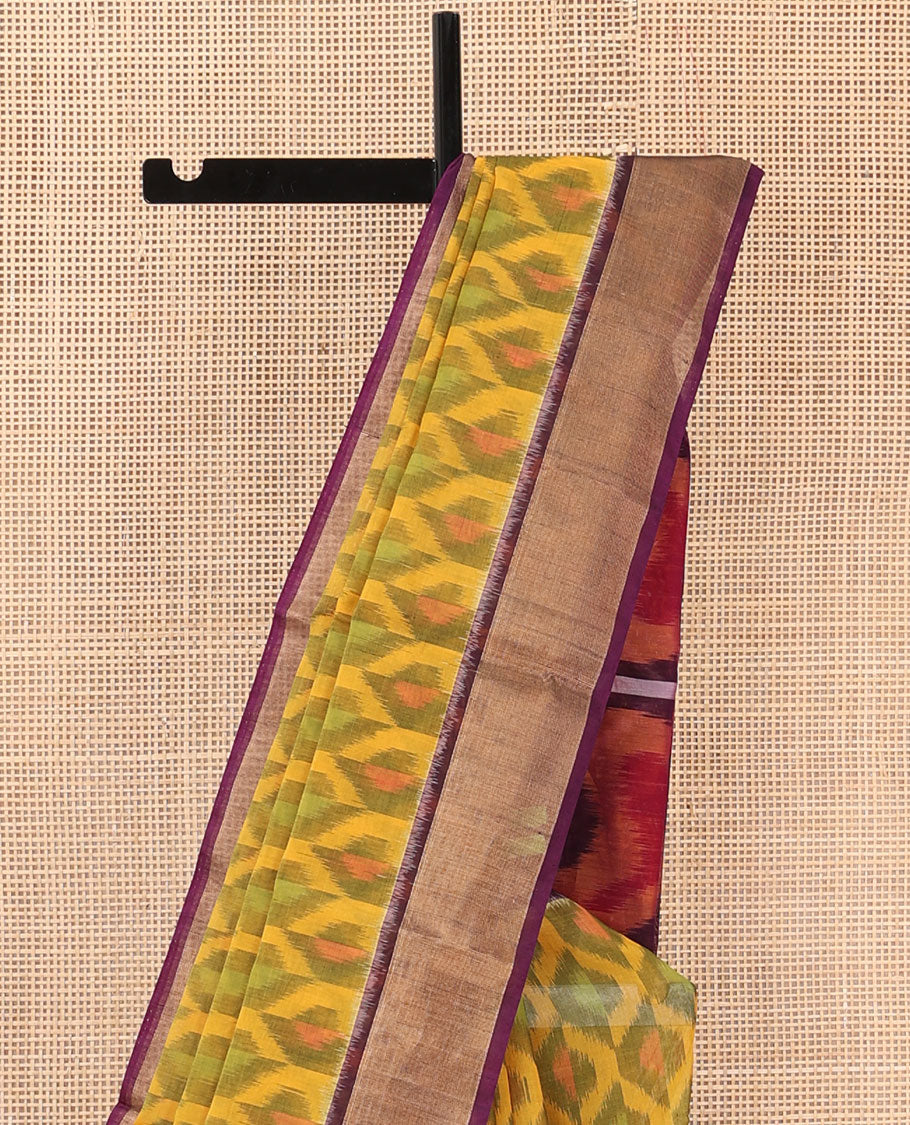 Yellow ikkat ogee patterned silk cotton saree, contrast zari bavanji border, and pallu of paisleys and checks