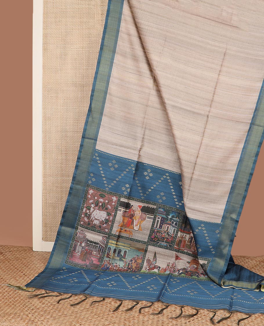 Sandal plain tussar silk saree, contrast bavanji border, and pallu of Mughal and Pichwai inspired motifs