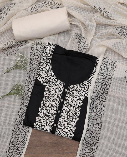 Black material chudidar set, white floral vine neck embroidered top, contrast plain bottom and chex dupatta of unique motifs printed
