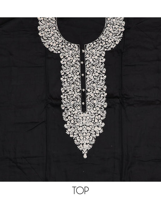 Black material chudidar set, white floral vine neck embroidered top, contrast plain bottom and chex dupatta of unique motifs printed