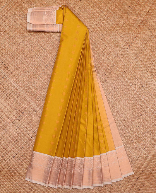 Mustard zari buttas gift saree, contrast traditional zari border of chakrams, and zari weave pallu