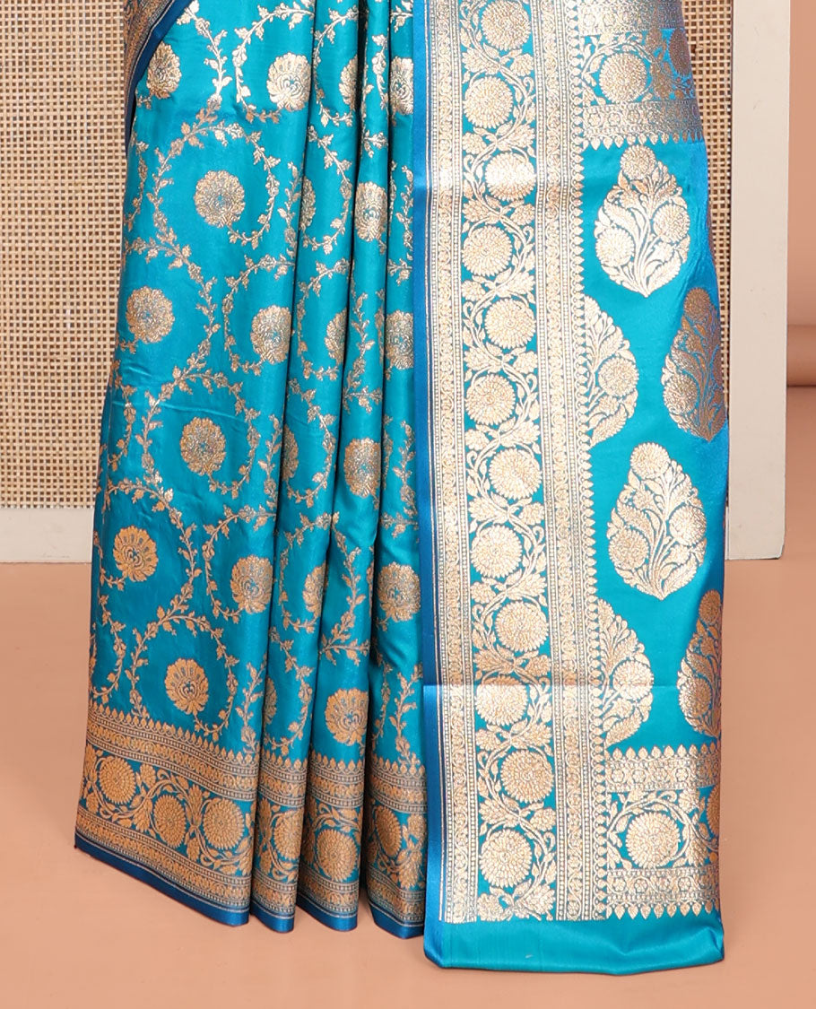 Blue Banarasi Nylon Saree, Highlighted by Floral Jacquard, Floral Creeper Zari Border, Intricate Pallu, and a Matching Blouse
