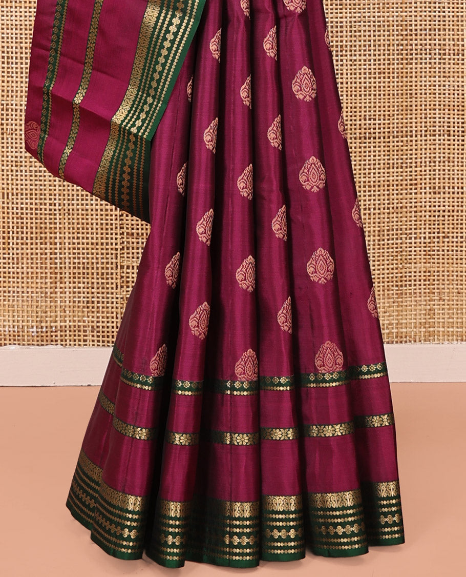 Maroon Vasundhara Lite Silk Mix Saree, Decked Up with Zari Buttas All Over Its Body, Complemented by Contrast Varisai Pettu Zari Border, Grandly Decked Up Pallu, and Paired with a Contrast Blouse