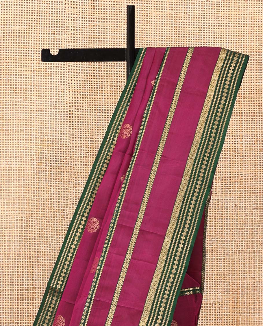 Maroon Vasundhara Lite Silk Mix Saree, Decked Up with Zari Buttas All Over Its Body, Complemented by Contrast Varisai Pettu Zari Border, Grandly Decked Up Pallu, and Paired with a Contrast Blouse