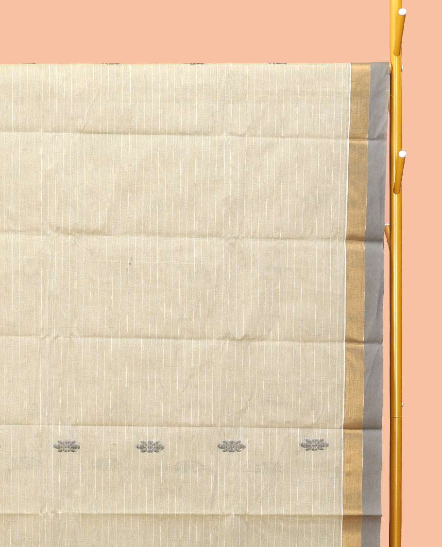 Off-White Kanchi Cotton Saree, Accentuated with Buttas, Complemented by a Contrast Border, Ogee Patterned Pallu, and a Matching Blouse
