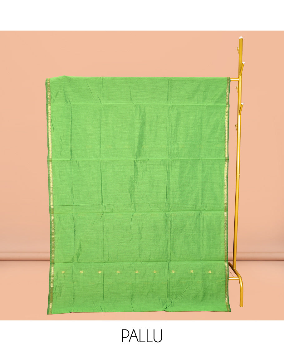 Leaf Green Maheshwari Cotton Saree, Prettified with Buttas All Over Its Body, Subtle Zari Piping Border, Complemented by a Contrast Pallu Steeped with Buttas, and Paired with a Contrast Blouse