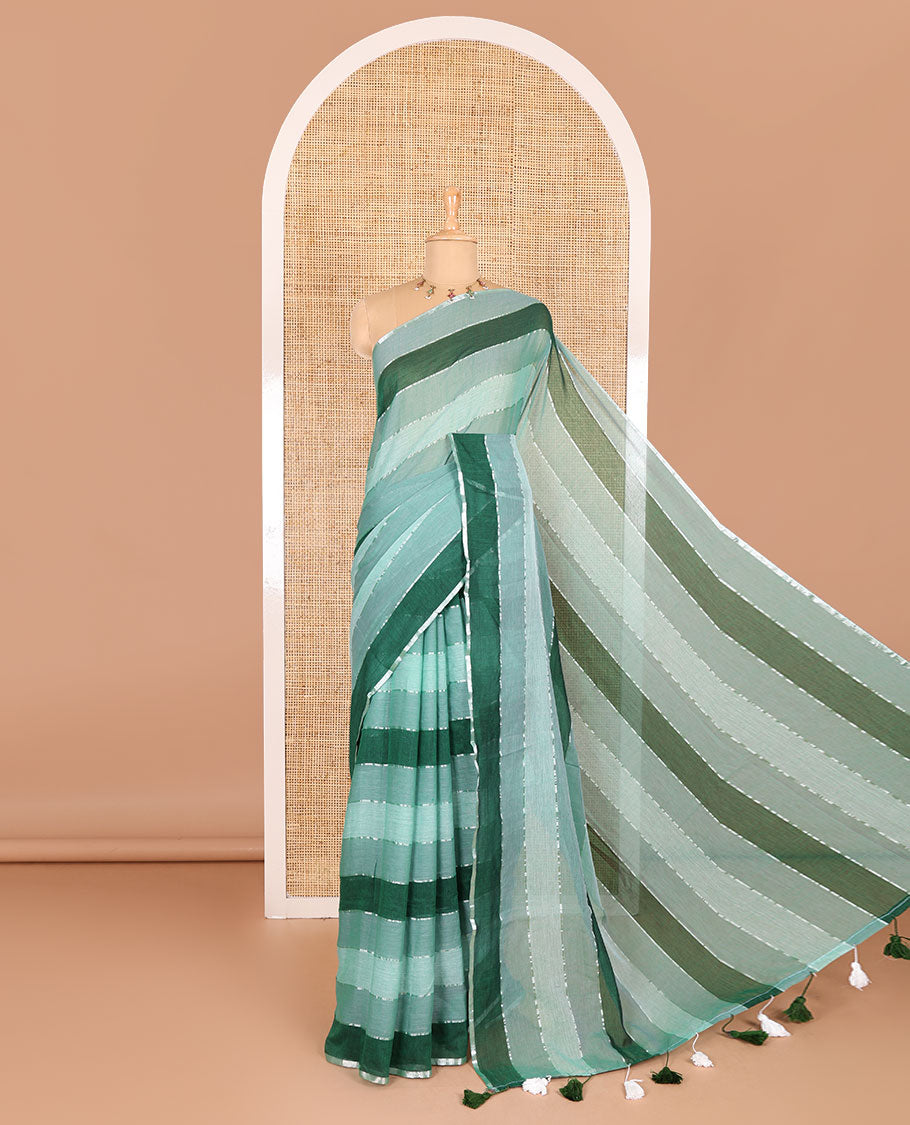 Light green ombre-colored striped khadi mul cotton saree, zari piping border, striped pallu, and a matching striped blouse