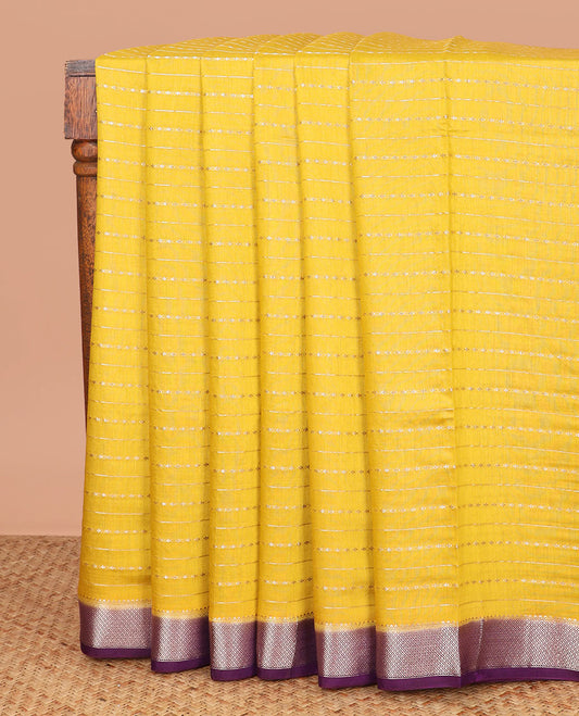 Yellow zari striped assam silk saree, contrast traditional zari border, and zari striped pallu