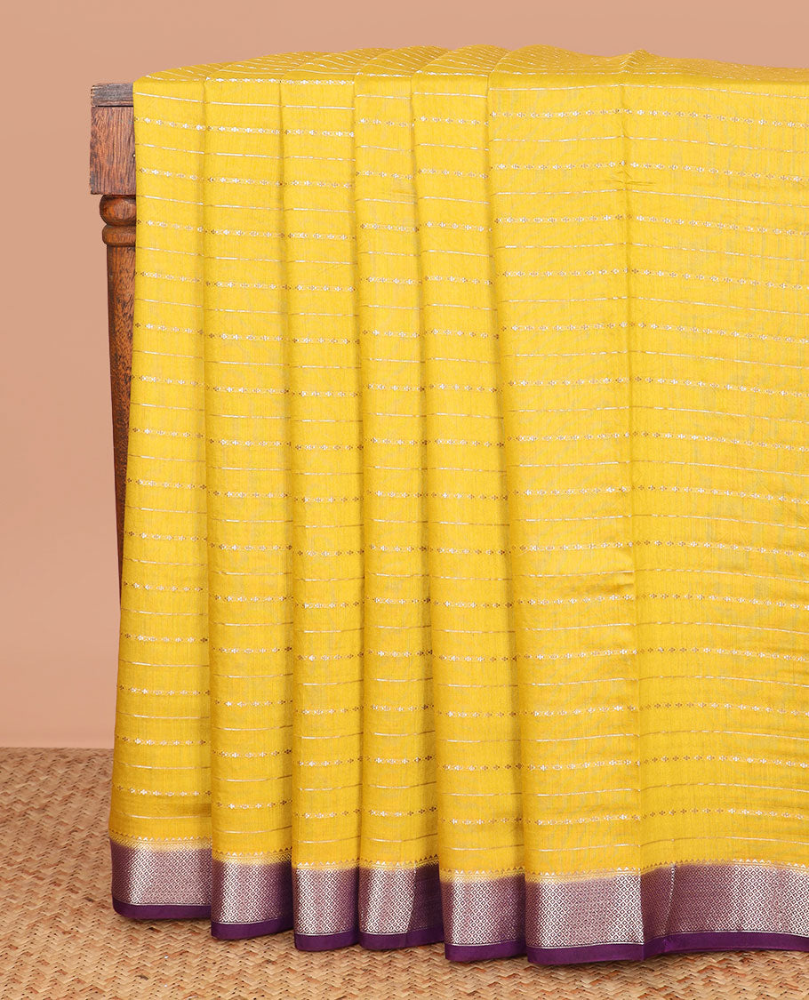 Yellow zari striped assam silk saree, contrast traditional zari border, and zari striped pallu