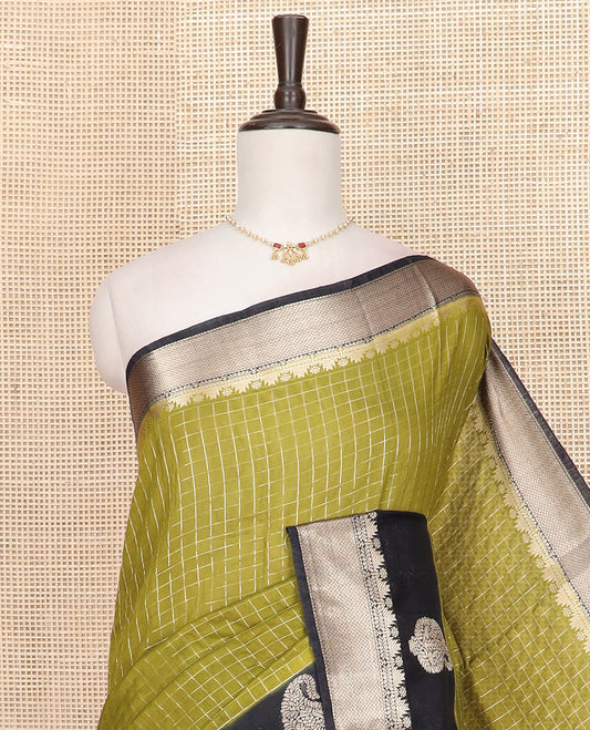 Green zari checked Assam silk saree, contrast traditional zari border of paisleys, and pallu of zari stripes