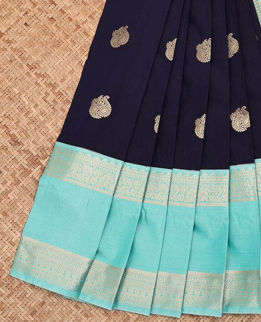 Navy Blue Budget Silk Saree, Gleamed Up with Zari Buttas All Over Its Body, Complemented by a Contrast Traditional Zari Design Rettai Pettu Border, Grand Jaal Pallu, and Paired with a Contrast Blouse