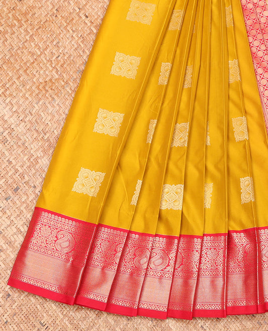 Yellow Budget Silk Saree, Enriched with Zari Buttas on Its Body, Complemented by a Contrast Traditional Zari Border of Paisleys, Grand Jaal Design Pallu, and Paired with a Contrast Blouse