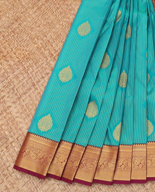 Blue Budget Silk Saree, Elevated with Stripes and Buttas, Complemented by Contrast Traditional Zari Border, a Grand Pallu and a Contrast Blouse