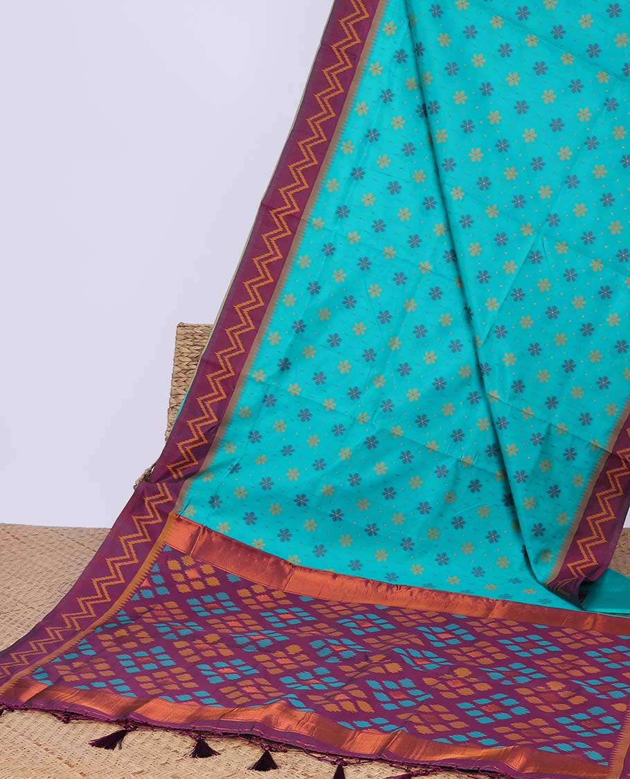 Blue floral motifs butter silk saree with contrast zig zag striped border & geometric motifs pallu
