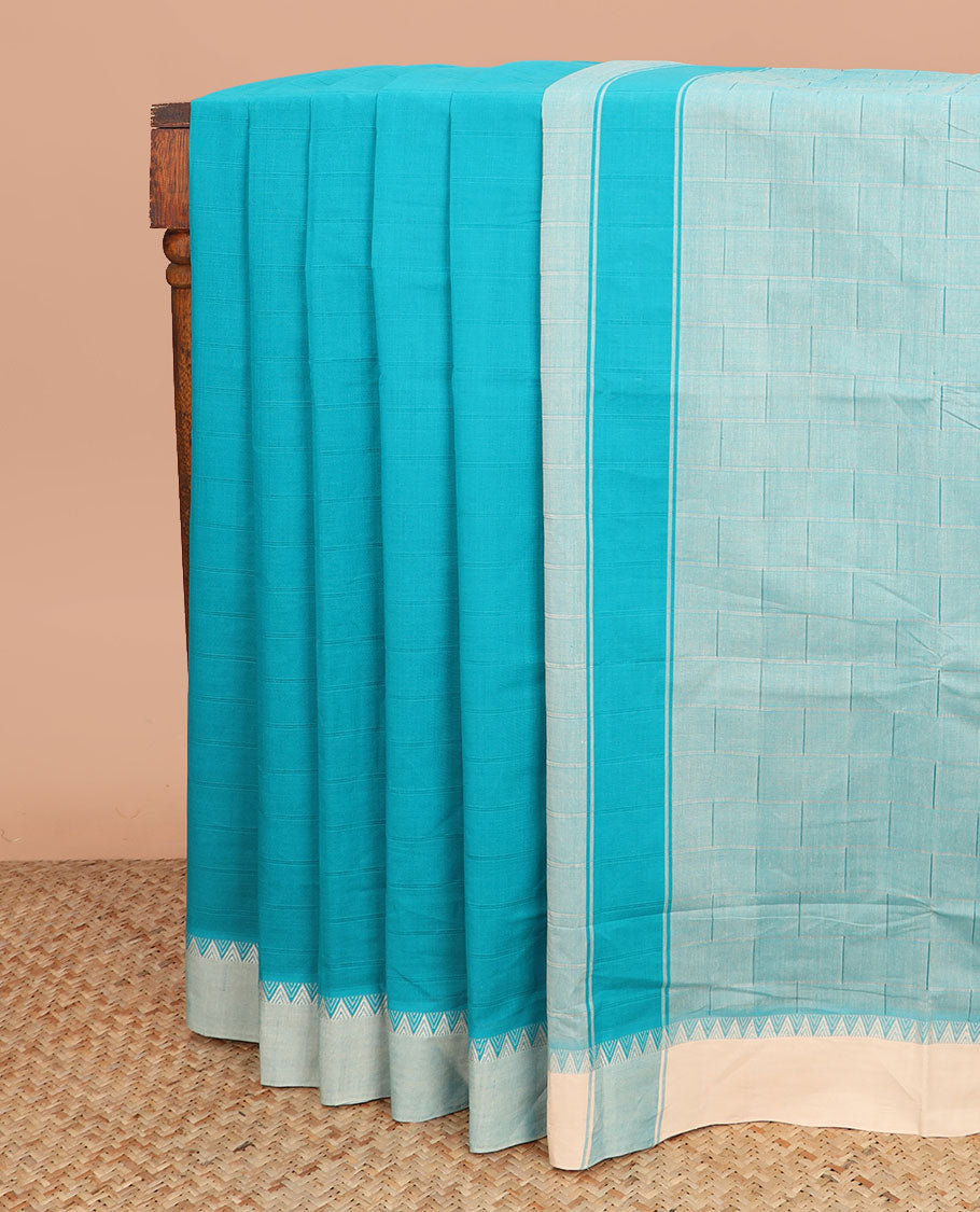 Sky blue checked Andhra cotton saree, contrast temple border, and pallu of buttas