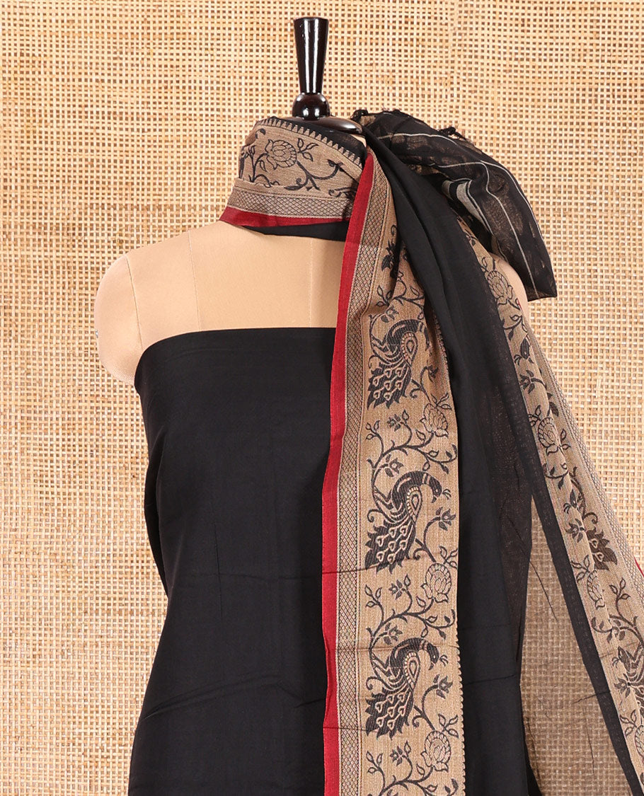 Black Mercerised Cotton Material Churidar Set, Subtly Made Plain with Contrast Floral-Peacock Bordered Top, a Mercerised Cotton Bottom, and Paired with a Mercerised Cotton Peacock-Bordered Dupatta