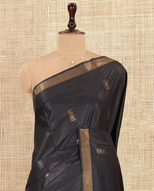 Black Tussar Saree, Finely Crafted with Warli Buttas, a Zari Border, Warli-Themed Thread-Woven Pallu, and a Matching Blouse