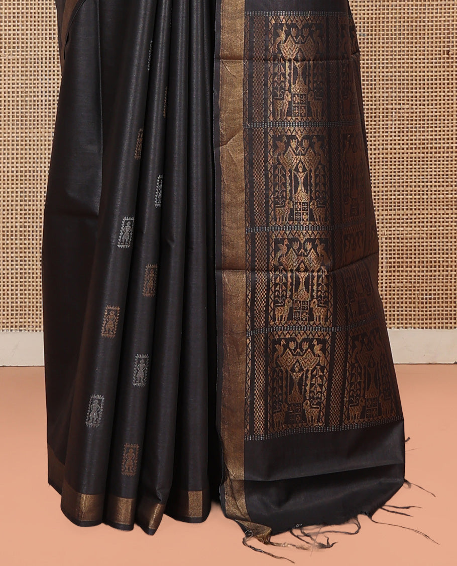 Black Tussar Saree, Finely Crafted with Warli Buttas, a Zari Border, Warli-Themed Thread-Woven Pallu, and a Matching Blouse