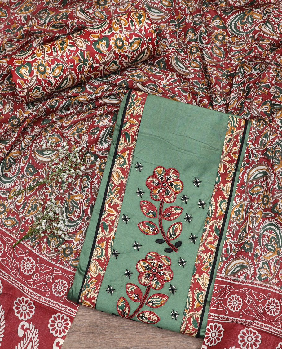 Green material chudidar set,  neck embroidered top, contrast bottom, and dupatta of kalamkari style, floral-paisley vine