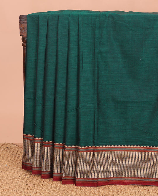 Dark green plain Narayanapet cotton saree, contrast geometric patterned thread border, and striped pallu