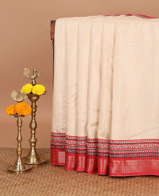 Cream vertical zari striped dola silksaree,contrast red traditional zari border & intricately Ajrakh-style printed pallu