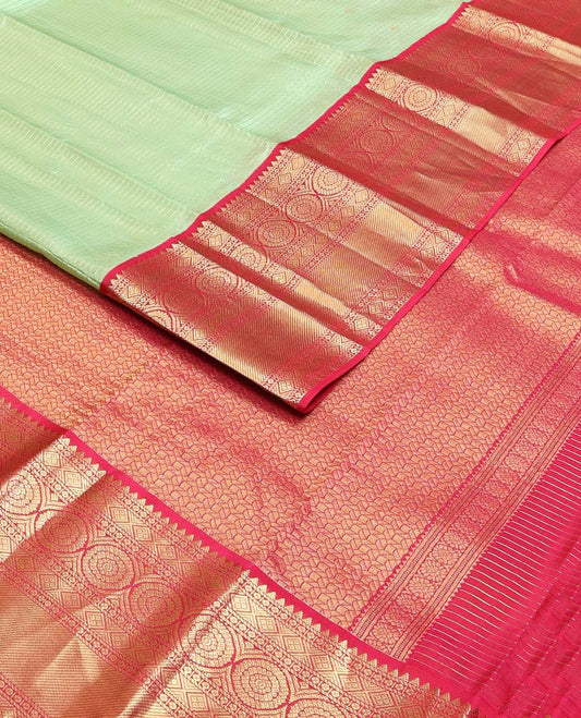 Pista green zari buttas & checked Vasundhara silk mix saree, contrast border of rekku,diamond & chakram designs & geometric patterned pallu