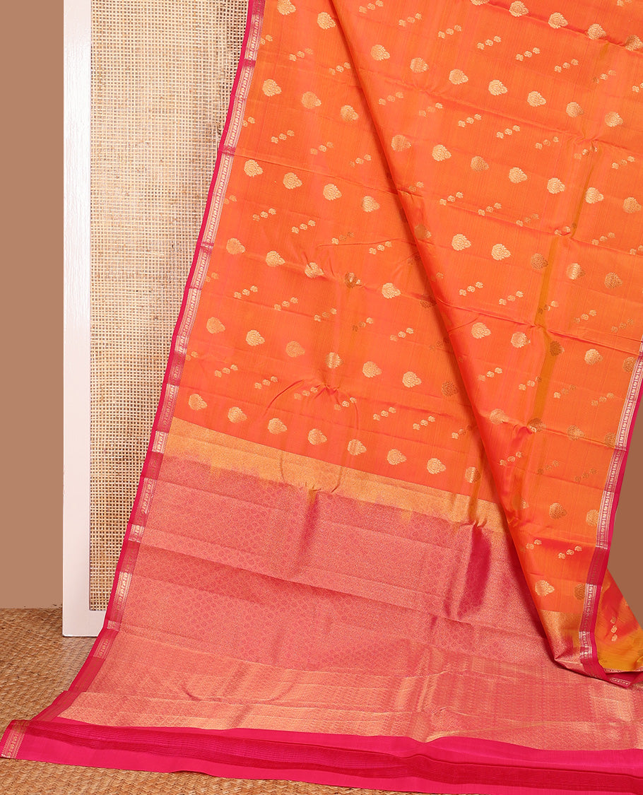 Orange stripes, and zari buttas Vasundhara silk mix saree, contrast border of rekku, kathir, and mayil designa, and zari-rich jaal pallu