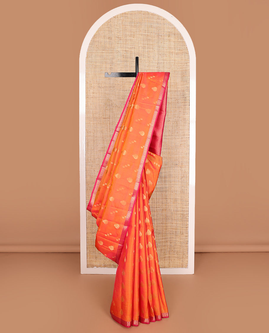 Orange stripes, and zari buttas Vasundhara silk mix saree, contrast border of rekku, kathir, and mayil designa, and zari-rich jaal pallu