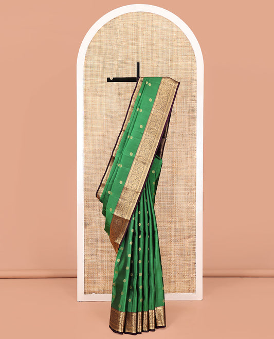 Green Vasundhara Lite Silk Mix Saree, Bedecked with Zari Buttas All Over Its Body, Complemented by Contrast Border of Kodi Visiry Designs, Grand Jaal Pallu and Paired with a Contrast Blouse
