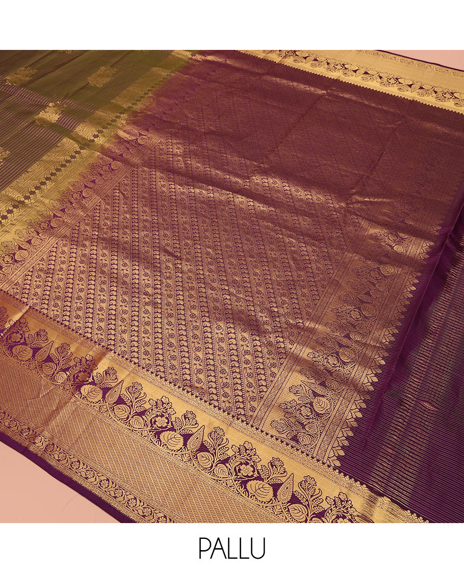 Green Vasundhara Silk Saree Elegantly Embellished with Floral Zari Buttas and Zari Checks, Highlighted by a Contrast Border of Traditional Zari Designs, Pallu Steeped with Manga and Kodi Vivsy Designs, and Paired with a Contrast Blouse