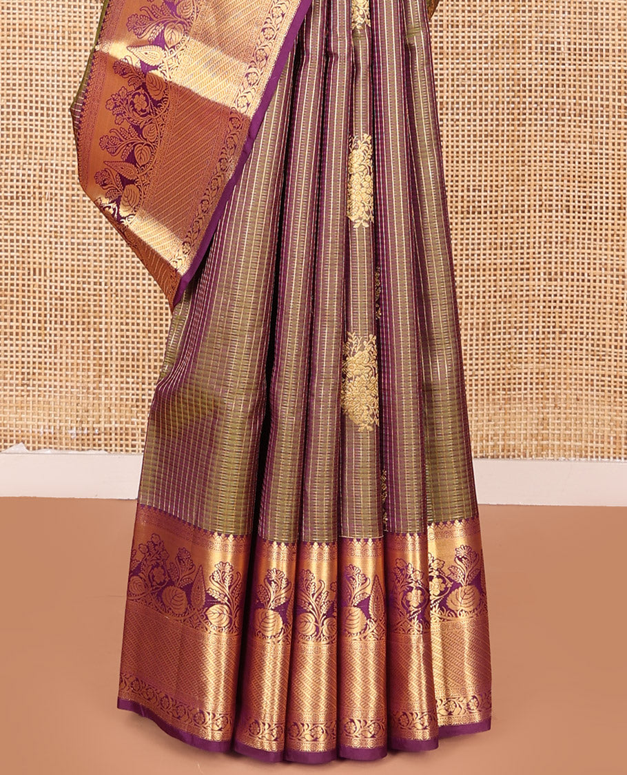 Green Vasundhara Silk Saree Elegantly Embellished with Floral Zari Buttas and Zari Checks, Highlighted by a Contrast Border of Traditional Zari Designs, Pallu Steeped with Manga and Kodi Vivsy Designs, and Paired with a Contrast Blouse