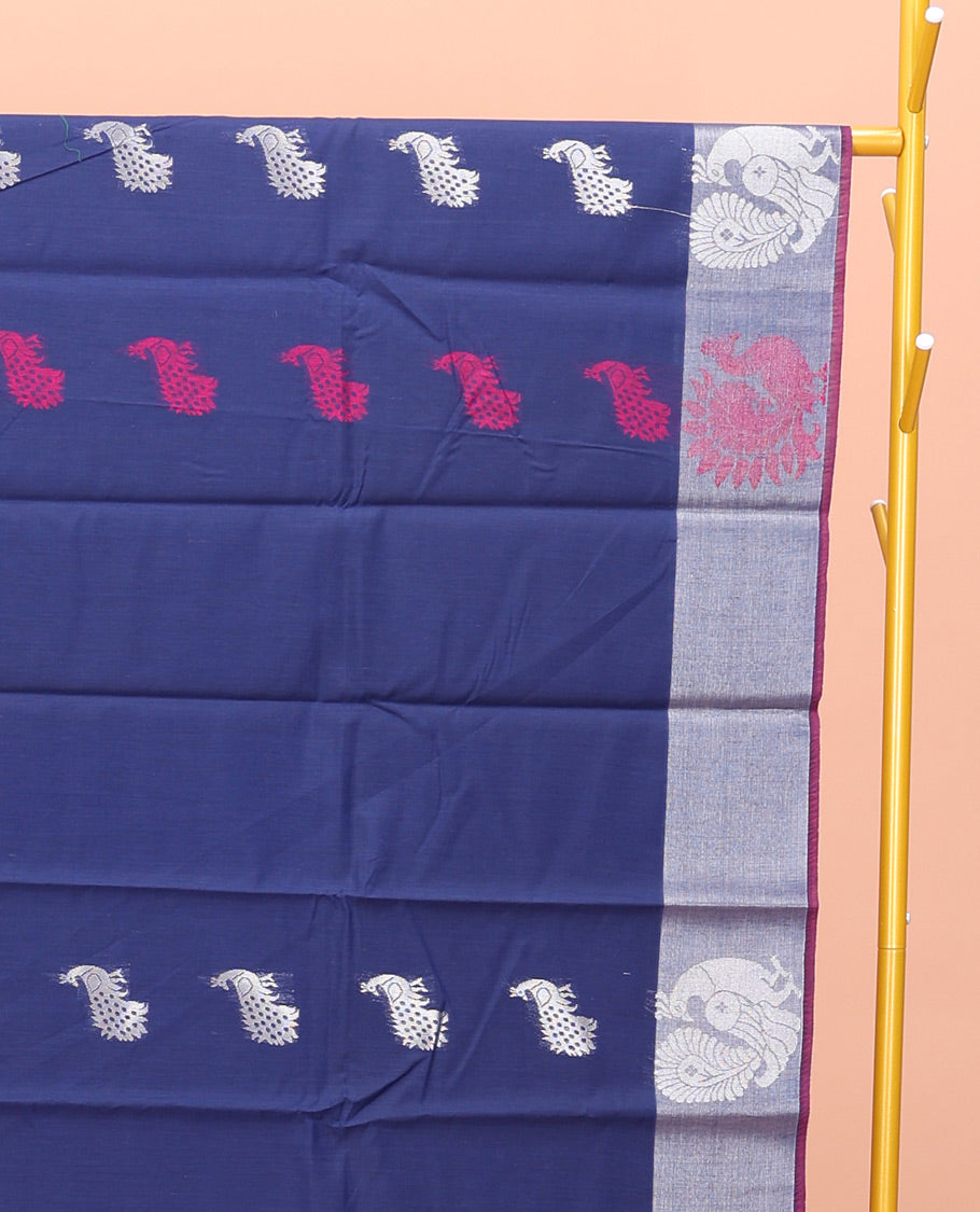 Navy Blue Semi-Silk Cotton Saree, Beautifully Detailed with Peacock Buttas on Its Body,  Highlighted by Peacock Border, Pallu Steeped with Peacock Designs, and Paired with a Matching Blouse