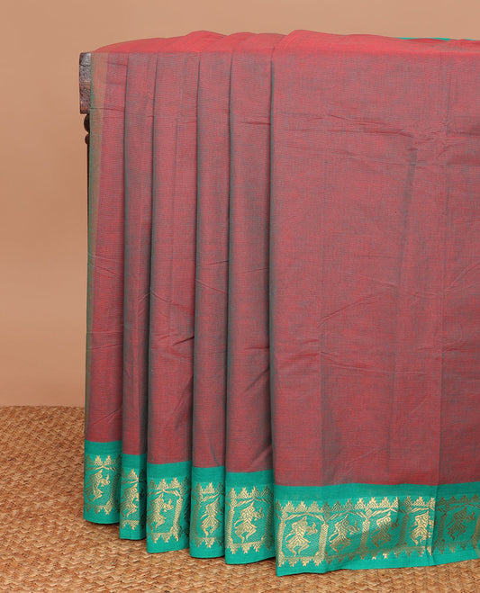 Red dual-tone plain Chettinad cotton saree, contrast zari temple border of human figurines & orange striped pallu