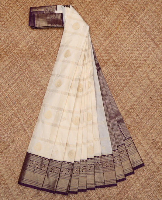 Cream Budget Silk Saree, Mesmerized with Zari Butta Enclosed Checks, a Contrast Traditional Zari Border, Grand Pallu, and a Contrast Blouse