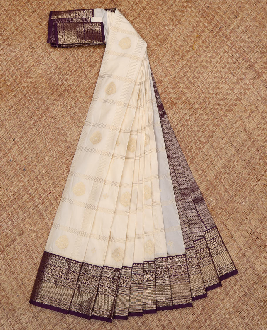 Cream Budget Silk Saree, Mesmerized with Zari Butta Enclosed Checks, a Contrast Traditional Zari Border, Grand Pallu, and a Contrast Blouse