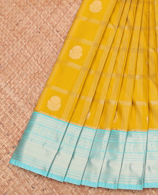 Yellow Budget Silk Saree, Sparsely Sparkled with Zari Butta Enclosed Checks, Complemented by a Contrast Traditional Zari Border, Grand Pallu, and Contrast Blouse
