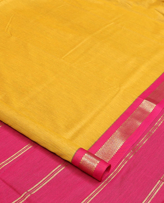 Yellow plain nine-yard cotton saree, contrast traditional zari border, and striped pallu