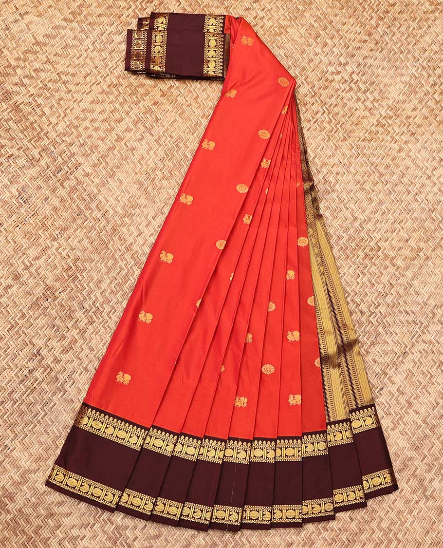 Orange Budget Silk Saree, Gleamed Up with Zari Buttas, Complemented by a Contrast Traditional Zari Rettai Pettu Border, Geometric Pallu, and a Contrast Blouse