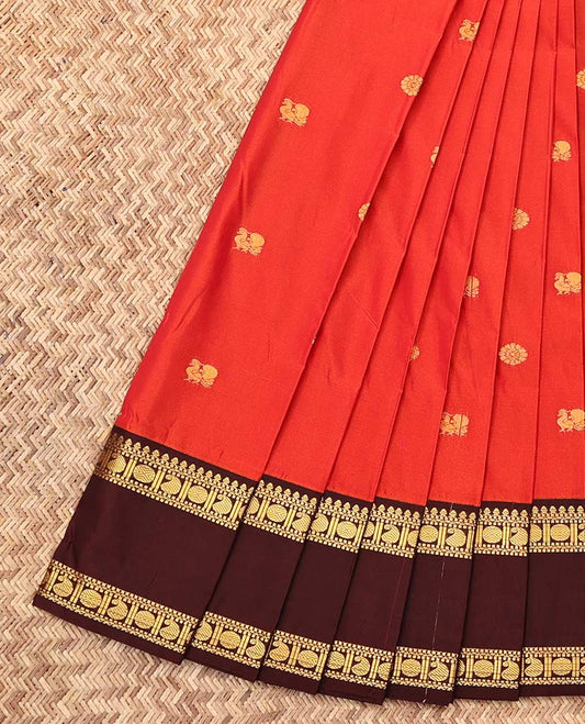 Orange Budget Silk Saree, Gleamed Up with Zari Buttas, Complemented by a Contrast Traditional Zari Rettai Pettu Border, Geometric Pallu, and a Contrast Blouse
