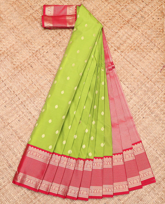 Green Budget Silk Saree, Beautifully Adorned with Zari Buttas All Over Its Body, Complemented by a Contrast Traditional Zari Design Border, a Grandly Jaal Patterned Pallu, and Paired with a Contrast Blouse