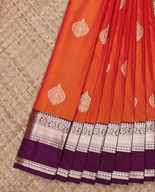 Orange Budget Silk Saree, Highlighted by Zari Buttas All Over Its Body, Complemented by a Contrast Traditional Zari Design Rettai Pettu Border, Intricately Designed Pallu, and Paired with a Contrast Blouse