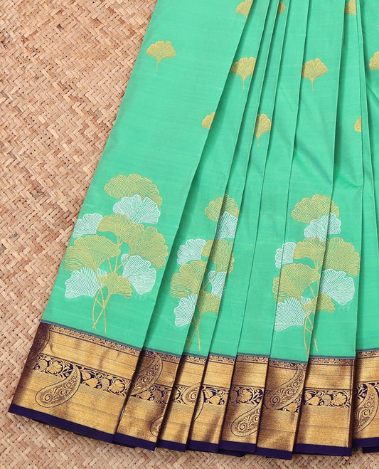 Green Budget Silk Saree, Meticulously Crafted with Leaf Buttas, Complemented by a Contrast Paisley Zari Border, Intricate Pallu, and Contrast Blouse