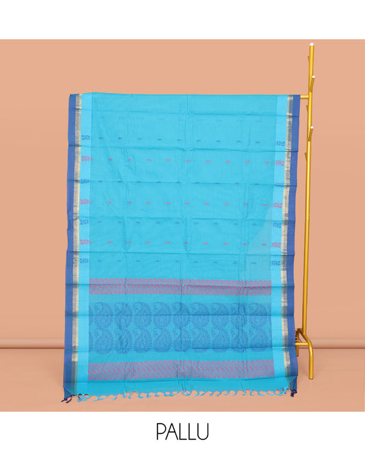 Blue Kanchi Cotton Saree, Accentuated with Buttas All Over Its Body, Complemented by a Contrast Border, Pallu of Paisley Designs, and Paired with a Matching Blouse