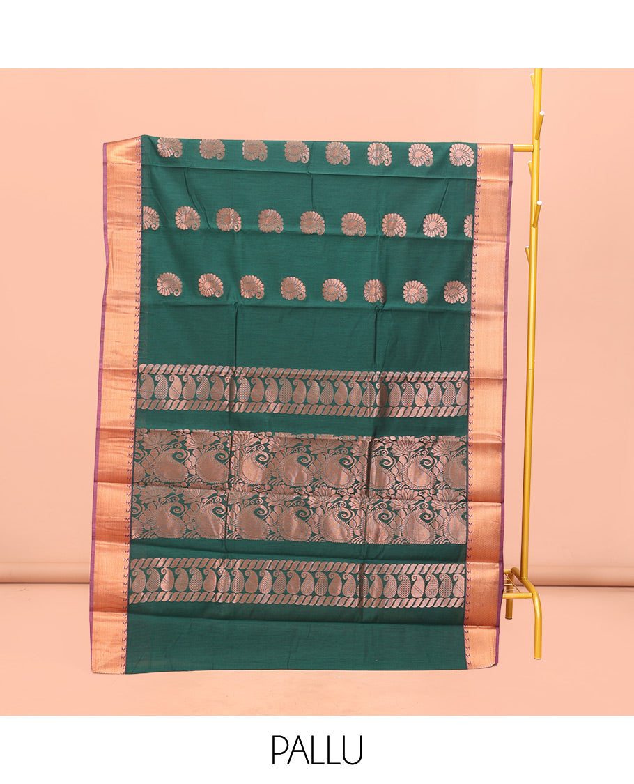 Green Semi-Silk Cotton Saree, Prettified with Paisley Buttas on Its Body, Complemented by Contrast Zari Border, Pallu Steeped with Paisley Designs, and Paired with a Matching Blouse