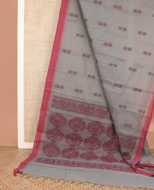 Orange floral buttas kanchi cotton saree, contrast border, and intricate pallu